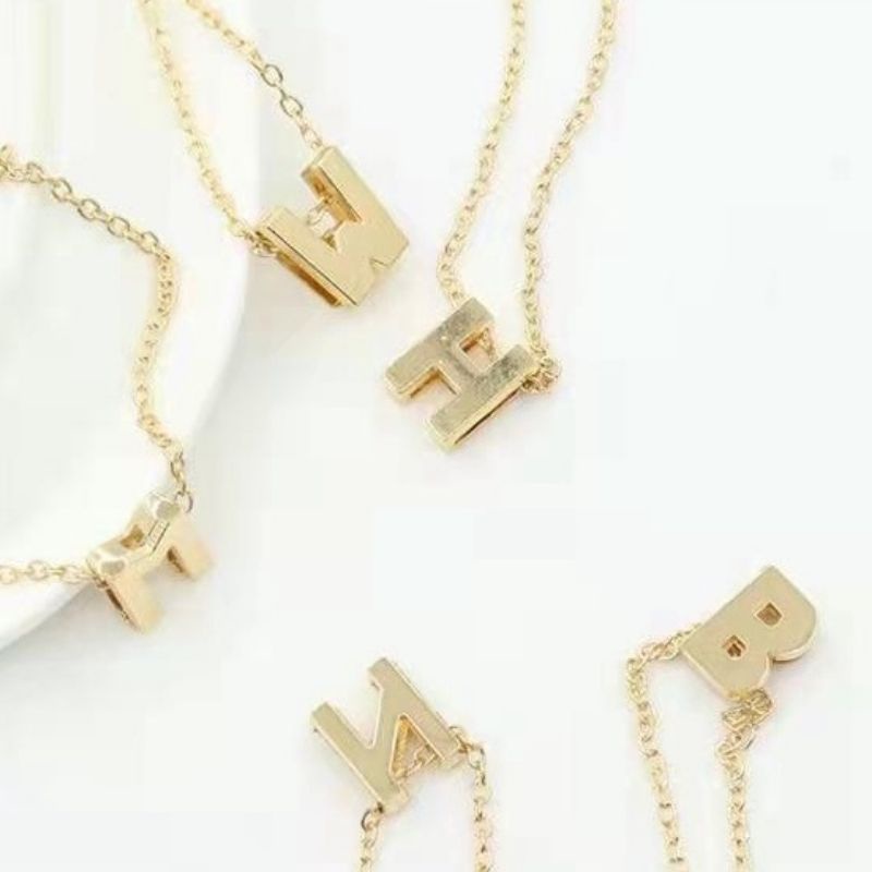 Kalung titanium huruf kalung huruf kalung impot