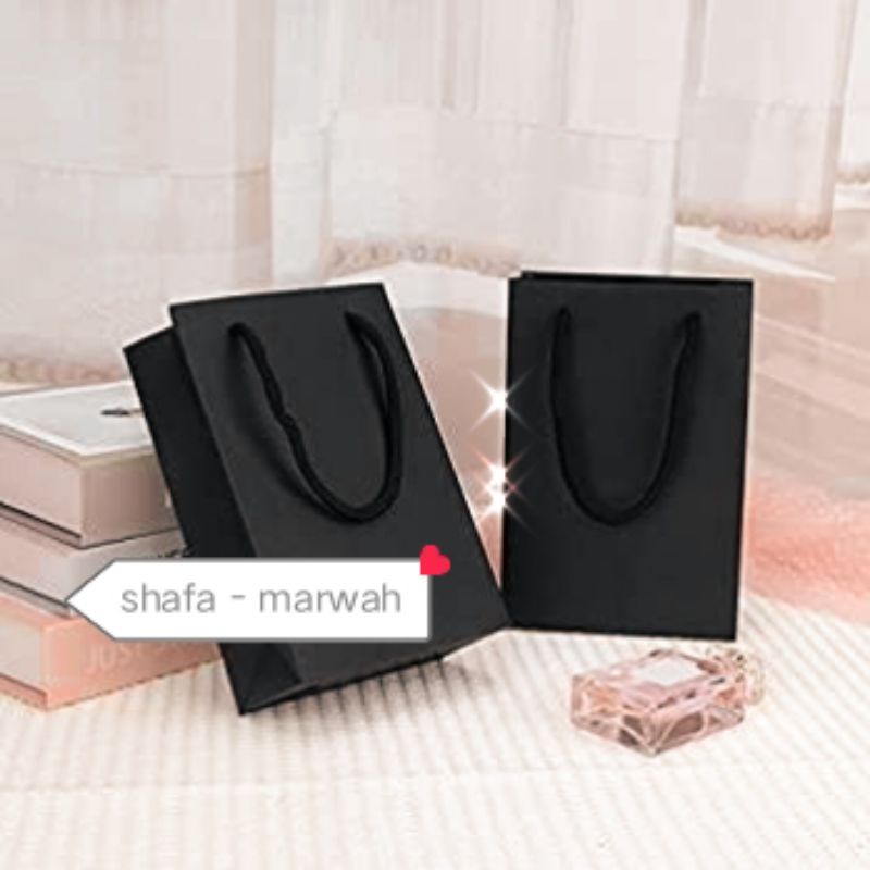 

daily & party merchandise gift . souvenir PAPERBAG mini black. Elegan.