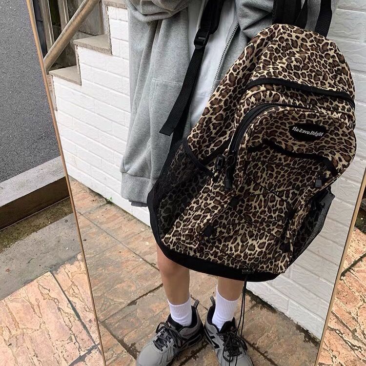 Sera dark wind and cool leopard print backpack pria dan wanita versi korea ins tas sekolah pelajar kasual berkapasitas besar all-match trendi versi korea