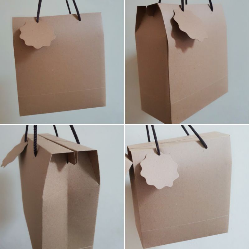 

Gable Box / Dus tenteng uk. P. 19 cm L. 9 cm T. 15.5 cm " M " ( 1 pack isi 10 pcs )