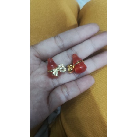 liontin kalung kendi