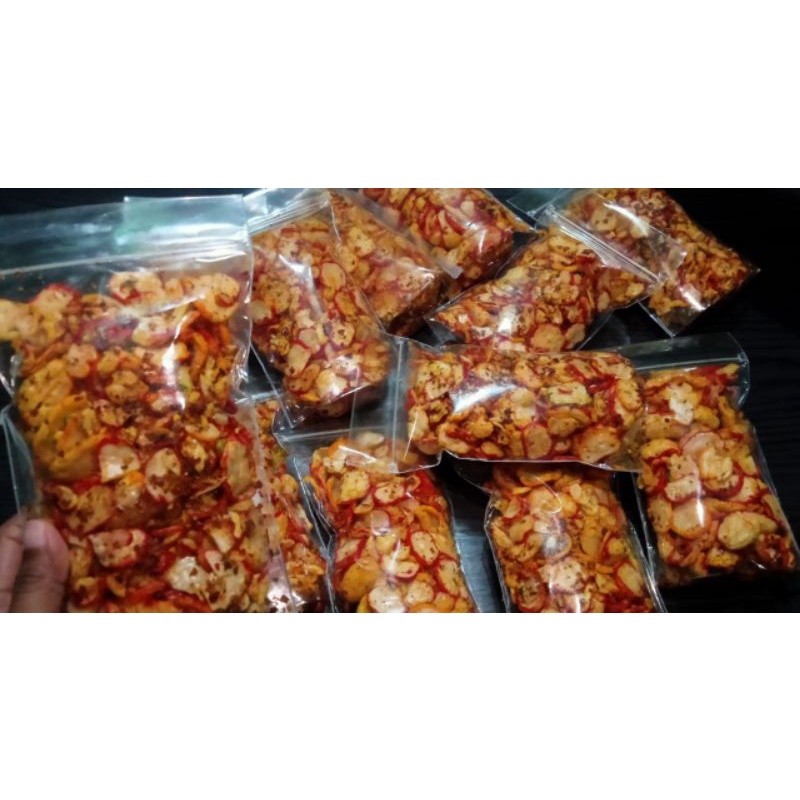 

KERUPUK SEBLAK KENCUR PEDAS 100GR