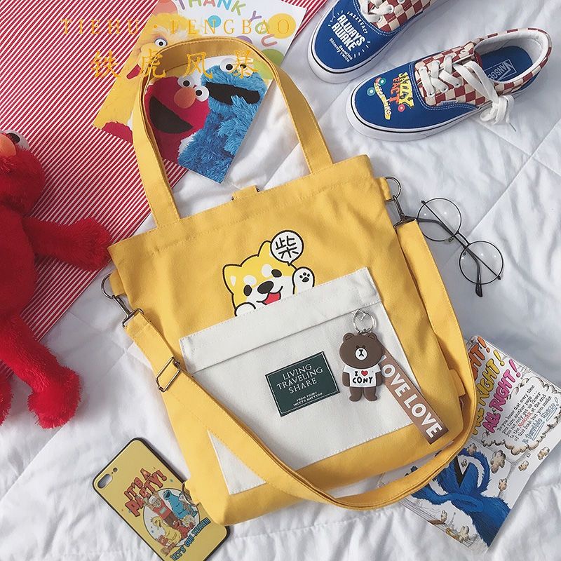 sera multi-tujuan messenger tas kanvas ransel wanita sastra kecil segar tas sekolah siswa versi korea in single