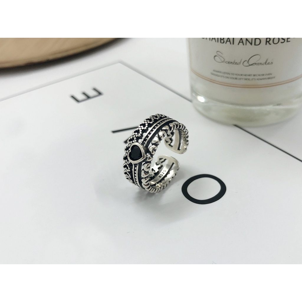 Cincin Model Terbuka Desain Hollow Warna Silver Gaya Vintage Untuk Wanita