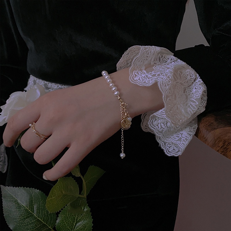 Gelang Manik-Manik Mutiara Keberuntungan Model Hollow out Fu Gaya Retro Adjustable Untuk Wanita