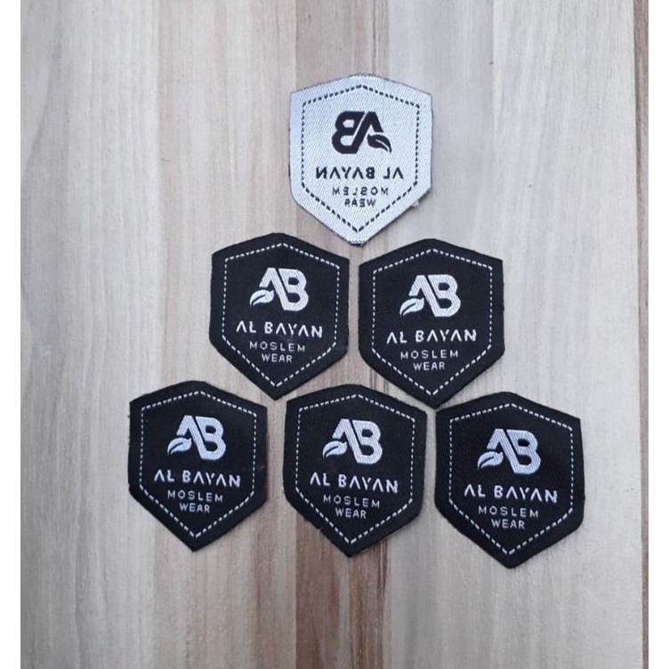 

label baju bordir woven bentuk ukuran 3cm x 3.5cm