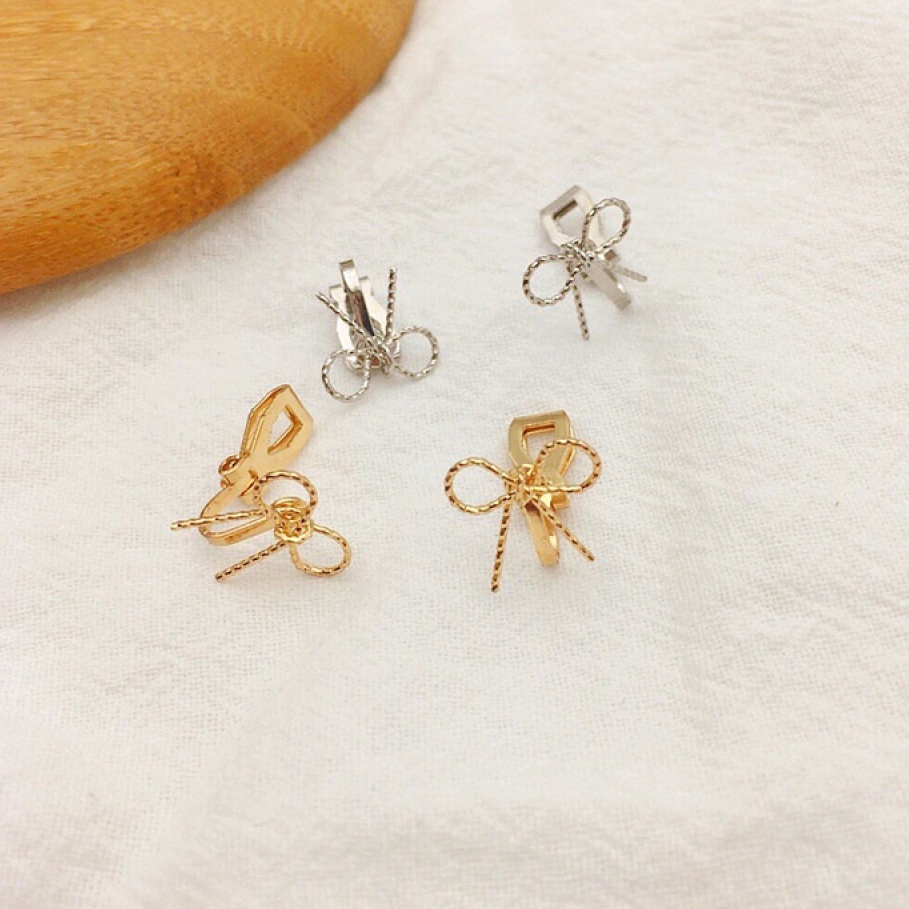 Anting Klip Tanpa Tindik Bentuk Pita Warna Emas / Silver Untuk Wanita