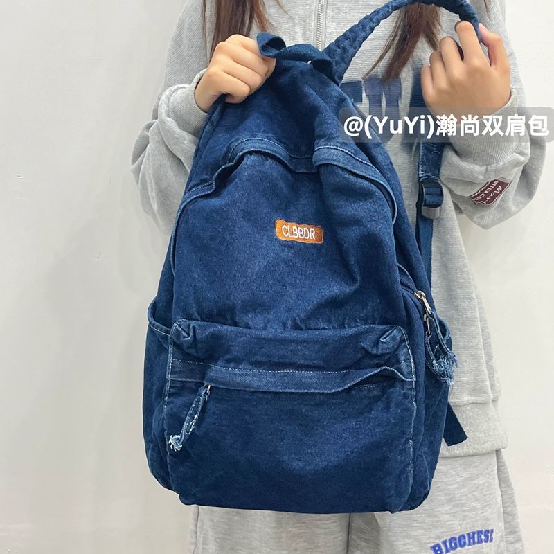 Sera mahasiswa Amerika high street retro denim ransel tua dicuci tas sekolah malas siswa ransel untuk pria dan wanita