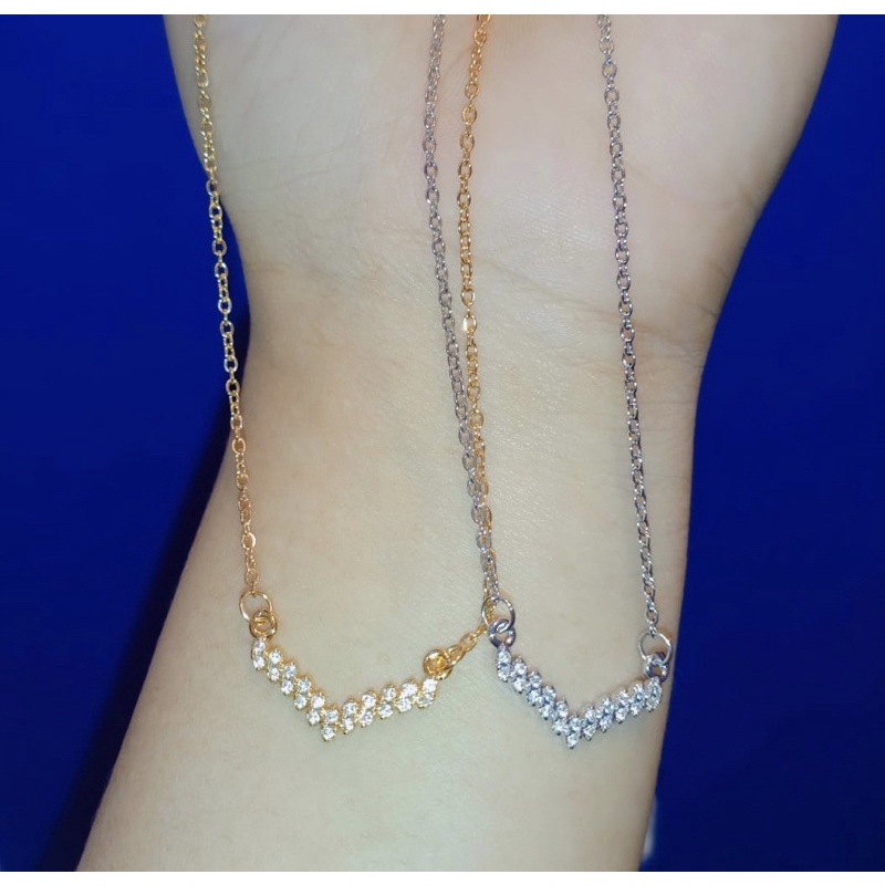 Kalung V fuji aurel Titanium asli simple persis ditoko emas asli