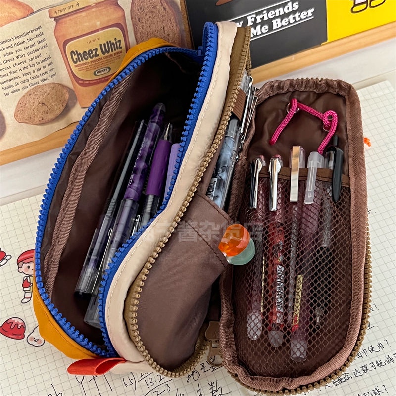 

✈✙►Sera warna kontras mahasiswa perempuan multi-fungsional niche kapasitas besar tiga lapis tas penyimpanan alat tulis retro bernilai tinggi tas pensil