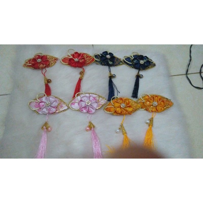 

pita imlek kipas tali emas