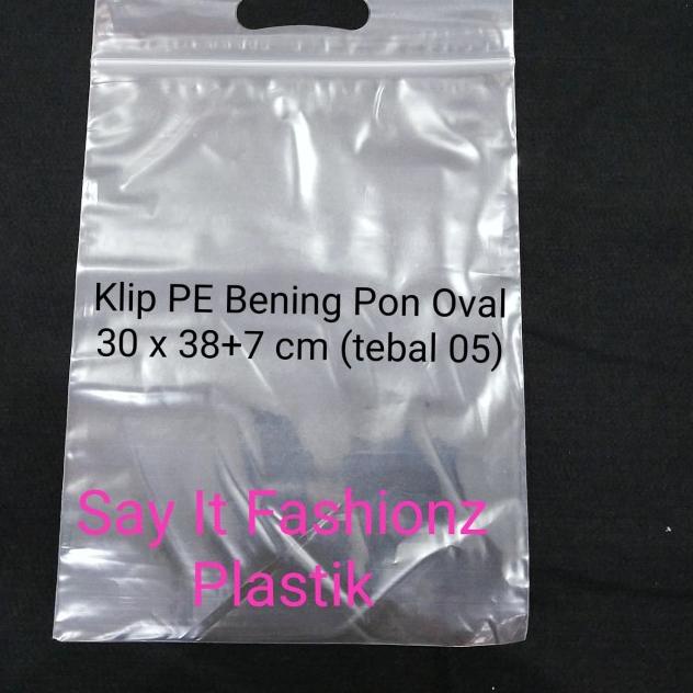 

Kantong Plastik Klip Pon Oval PE Bening 30x38+7cm tebal 05 isi 100lbr