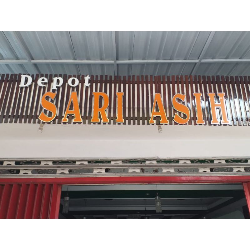 

papan nama stenless timbul