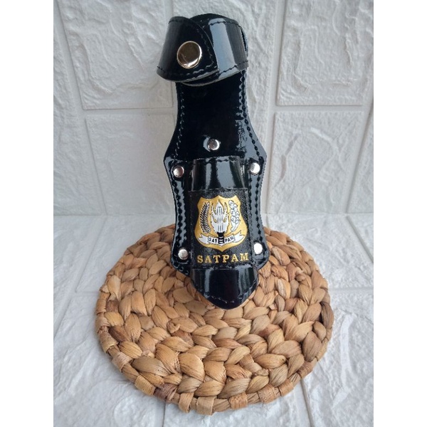 sarung tongkat satpam kilap