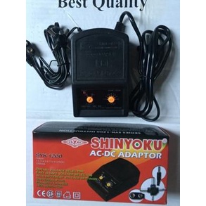 ADAPTOR UNIVERSAL AC/DC 1200MA MERK SHINYOKU
