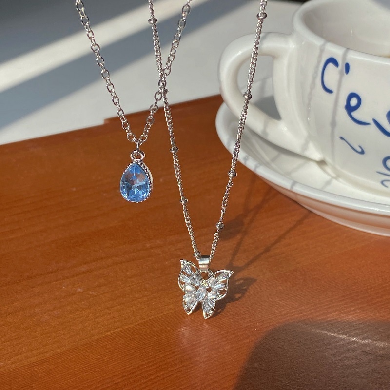 Kalung Rantai Klavikula Desain Kupu-Kupu Water Drop Bahan Zirkon Warna Biru Untuk Aksesoris