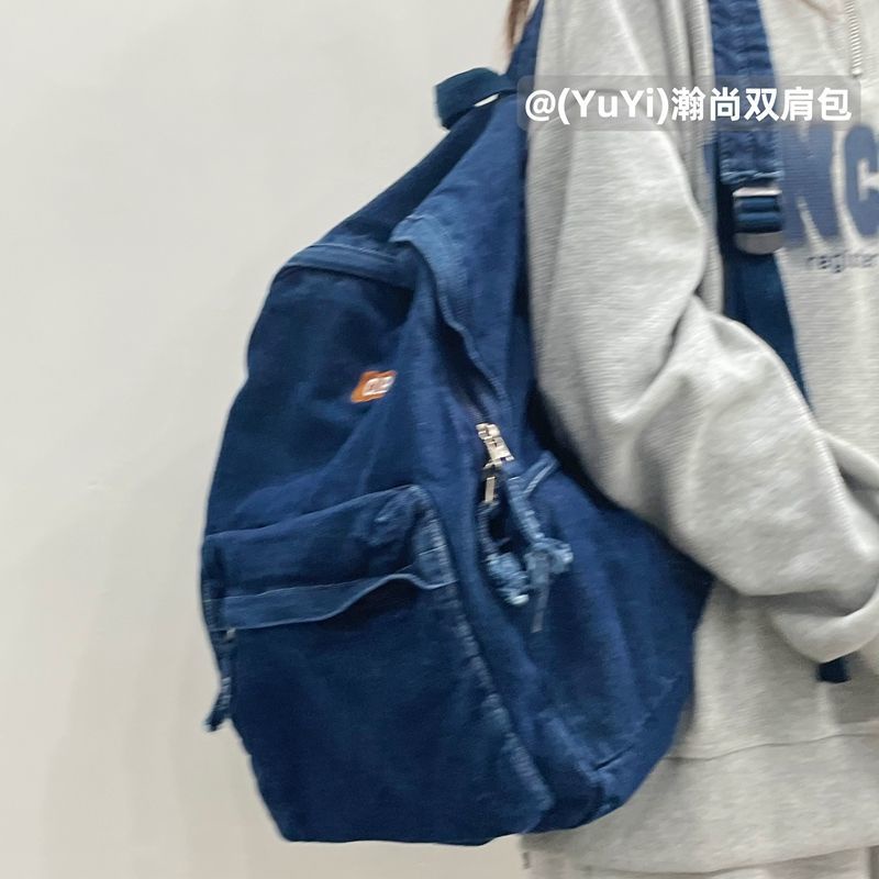 Sera mahasiswa Amerika high street retro denim ransel tua dicuci tas sekolah malas siswa ransel untuk pria dan wanita