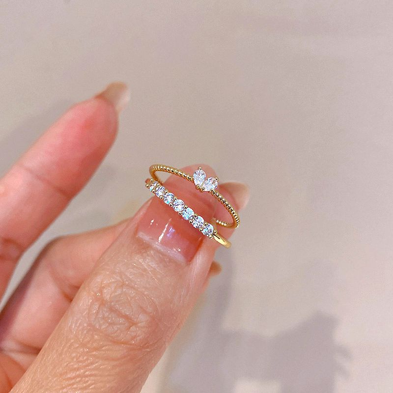 2pcs / Set Cincin Zircon Bentuk Hati Warna Emas Untuk Wanita