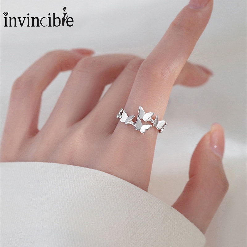 Cincin Model Terbuka Desain Kupu-Kupu Geometris Bahan Tembaga Warna Silver Gaya Vintage