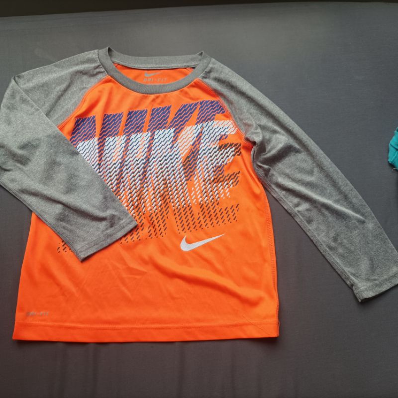 Preloved kaos dryfit Nik e tangan panjang