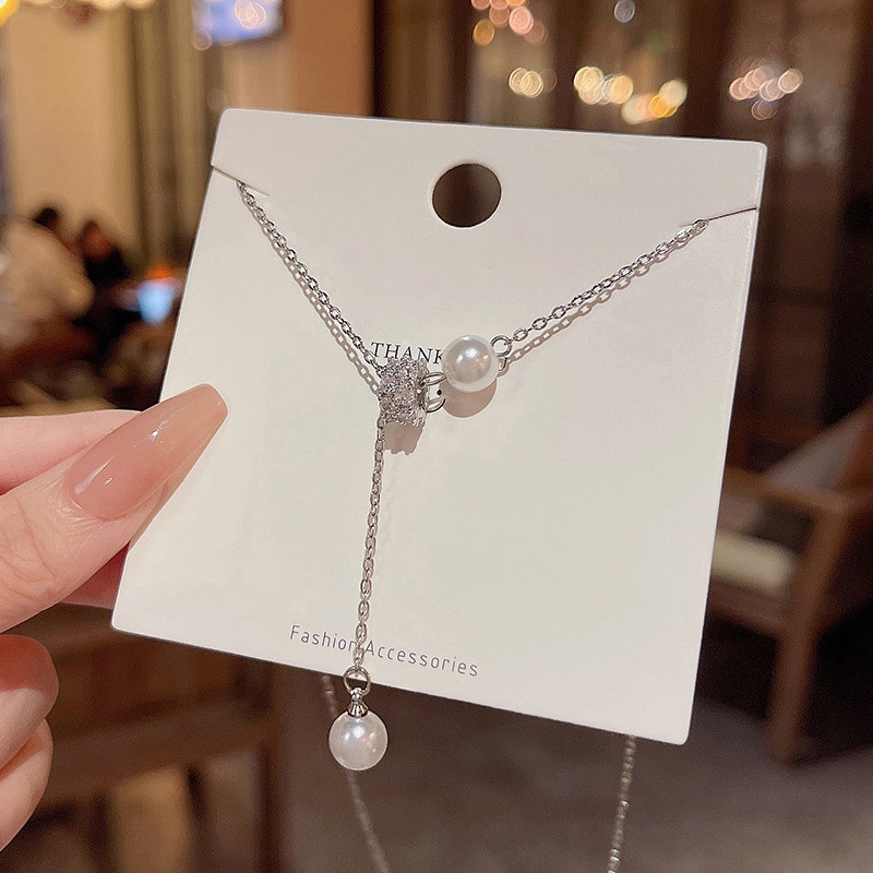 Kalung choker Bahan Titanium steel Dengan Liontin Rumbai Panjang Aksen Mutiara