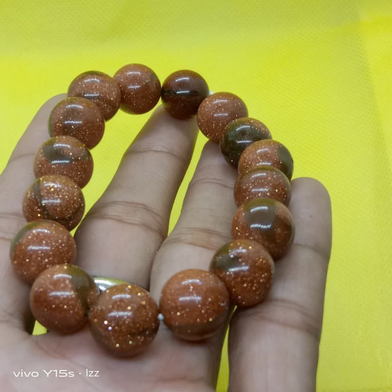 Gelang batu pasir emas