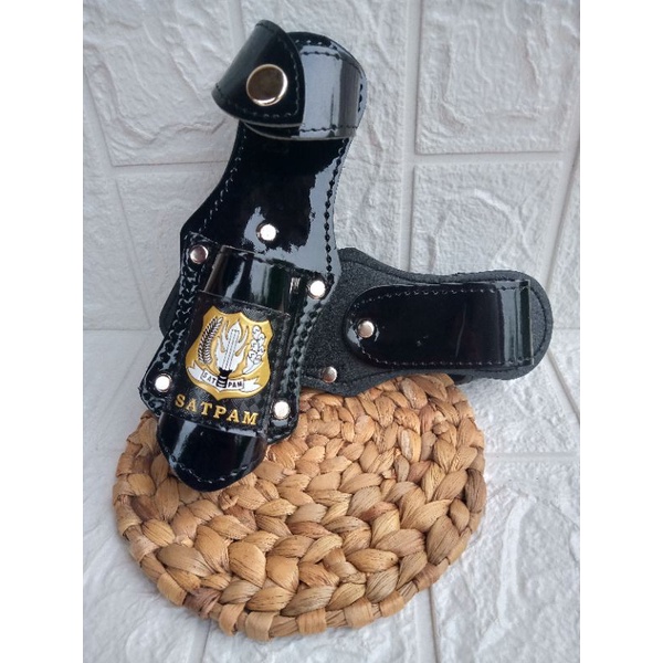sarung tongkat satpam kilap