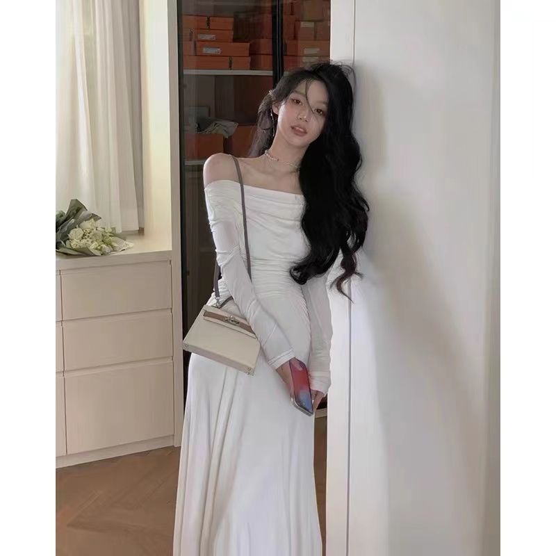 Gaun rajutan kerah menjuntai 2022 musim semi dan musim gugur off-the-shoulder lengan panjang temperamen desain ketat rasa angin lembut rok mid-length