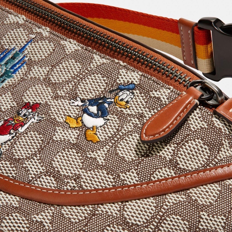 Coach Waistbag Disney X Coach League Belt Bag In Signature Textile Jacquard With Mickey Mouse And Friend Embroidery (C8491)