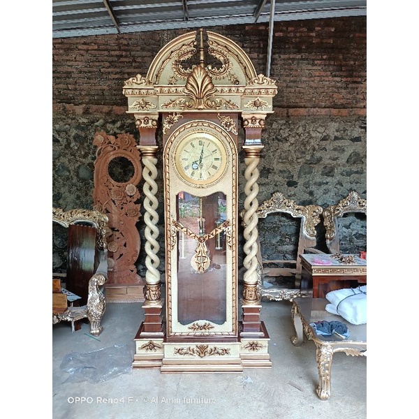 almari jam hias jati Jepara lemari pajangan lemari jam