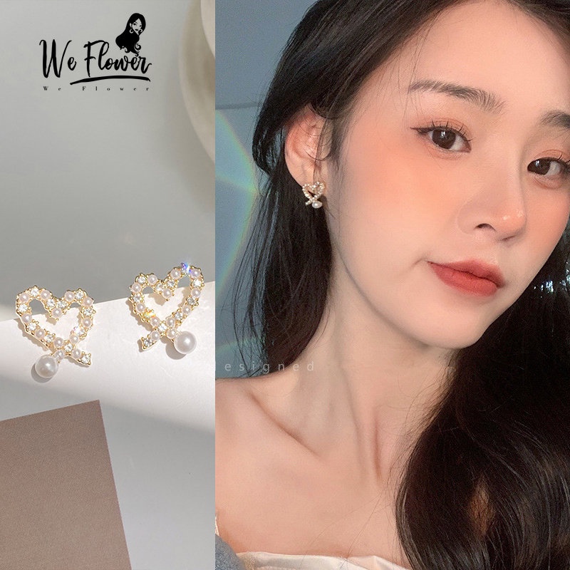 We Flower Anting Stud Desain Hati Hollow Aksen Mutiara Bahan Zirkon Gaya Korea Untuk Wanita