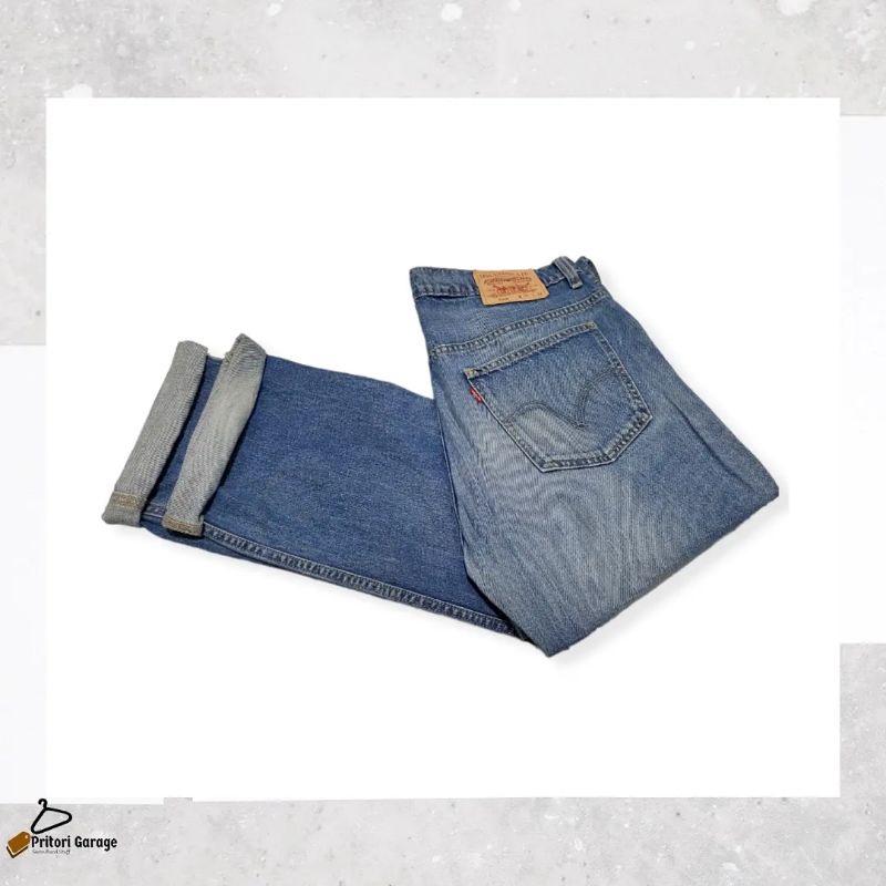Raw Denim Tebal Ripped Jeans Levis 523 Loose Fit Light Blue Wash Color Vintage 36