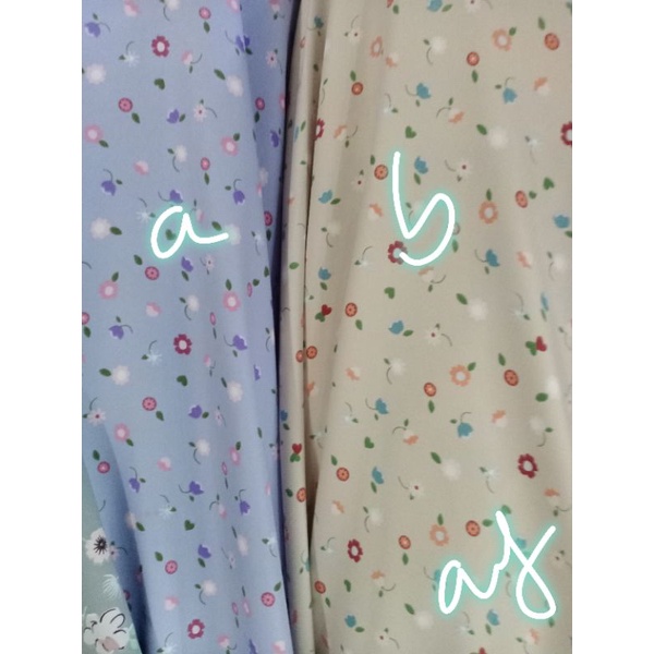kain shakila motif bunga kecil