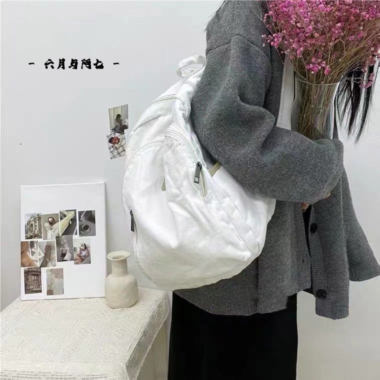 Tas Kanvas Wanita Malas Angin Jatuh Ransel Kapasitas Besar Siswa Sekolahnya♘Seraser Jepang Dicuci Kanvas Ransel Wanita Sederhana Serbaguna Tas Sekolah Tinggi Retro Jatuh Harajuku Gaya Tas Travel