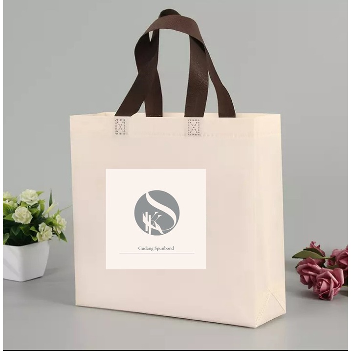 

Tas Spunbond SOS BOX tali 30x10x40 / goodie bag murah press / spunbund