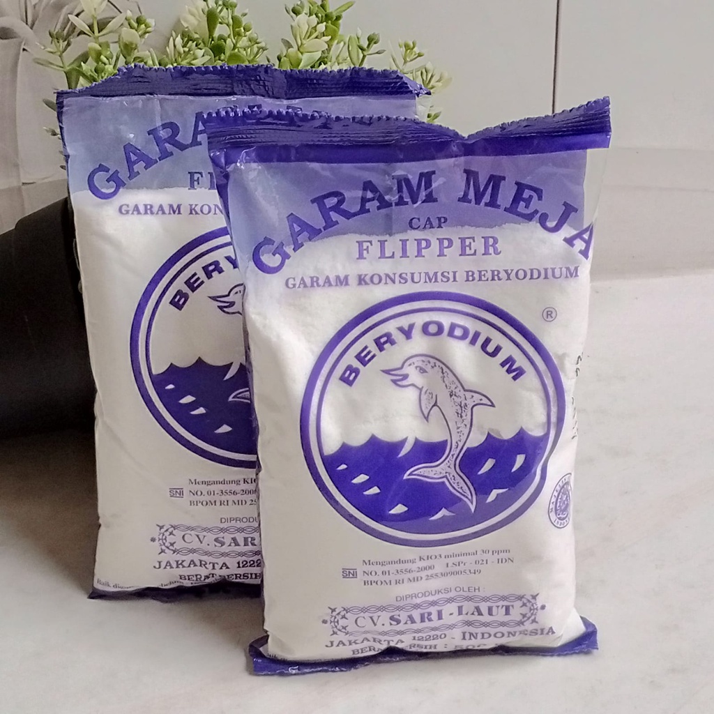 Garam Meja Cap Flipper