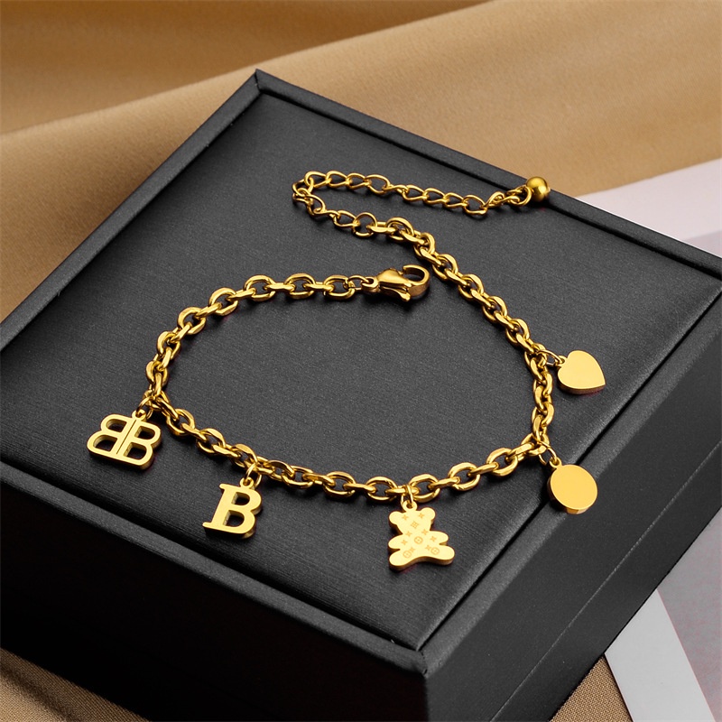 56625 - Gelang tangan B Bear titanium import anti karat