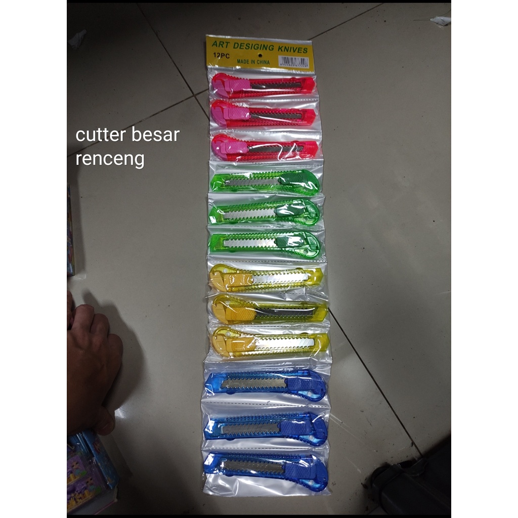

cutter transparan besar art desinging satuan vanco renceng