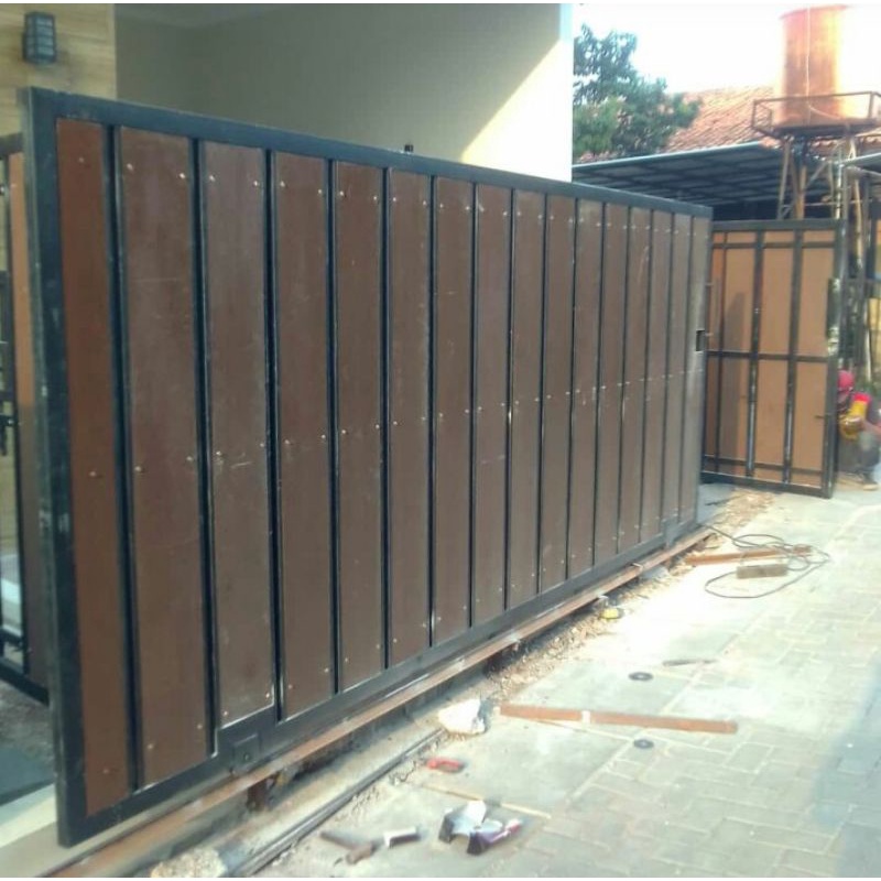 pagar besi kombinasi grc motif kayu