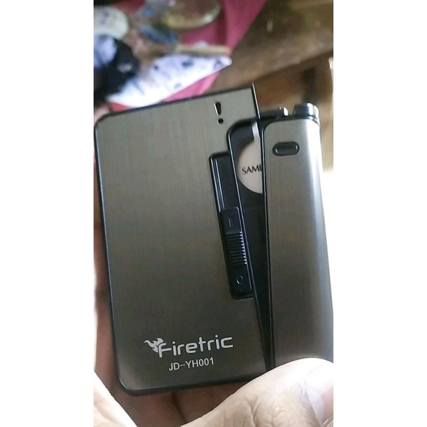 Firetric Kotak Bungkus Rokok Dengan Lighter Korek Api Slot