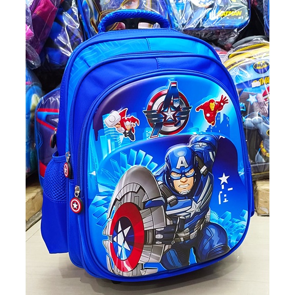 TROLLEY DORONG TAS ANAK SEKOLAH SD LAKI LAKI JAGOAN SUPER BINTANG GAMBAR DEPAN TIMBUL EMBOS 3RESLETING KANTUNG BESAR DAN LUAS IMPORT ( HPP HAPPY RUBY LAILA SD 16inch )