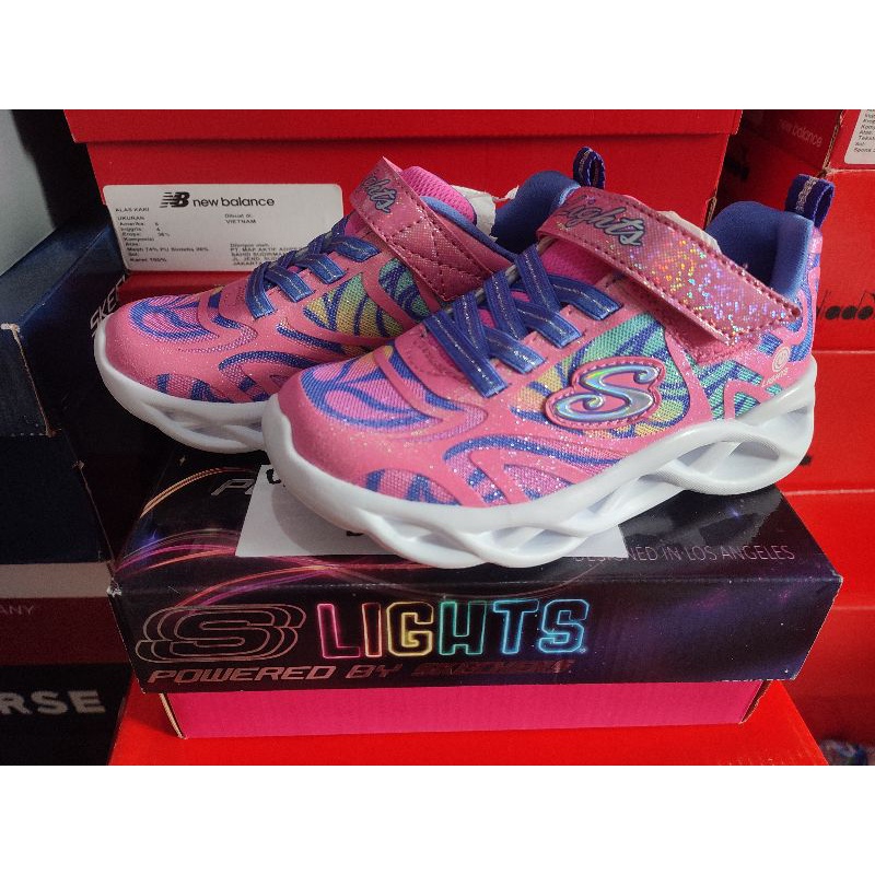 Sepatu anak perempuan skechers lampu warna ungu & pink