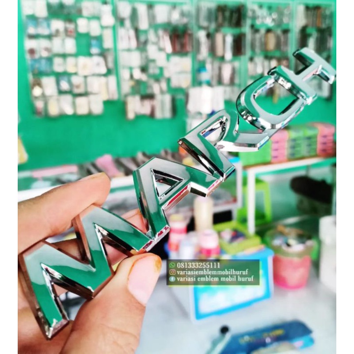 Emblem logo nissan MARCH