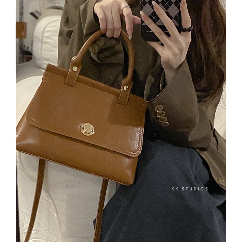 Tas kurir pesta mahasiswa Suhao perempuan 2022 fashion trendi baru tas kerja portabel retro semua cocok tas messenger berkapasitas besar