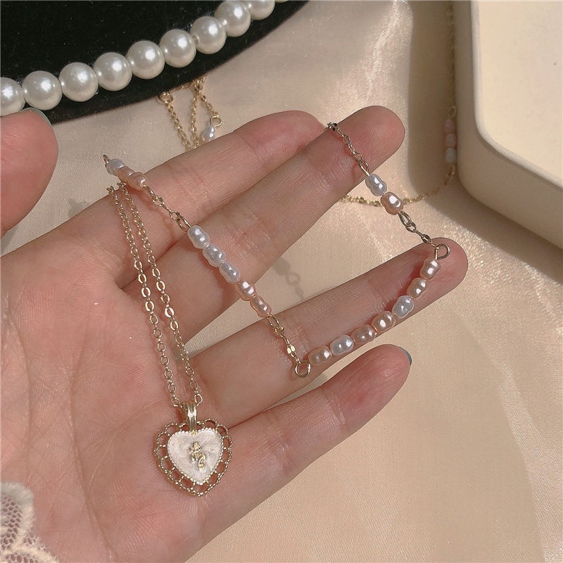 Pearl peach heart double-layer kalung perempuan 2022 musim panas baru high-end cahaya mewah super peri mawar rantai klavikula retro