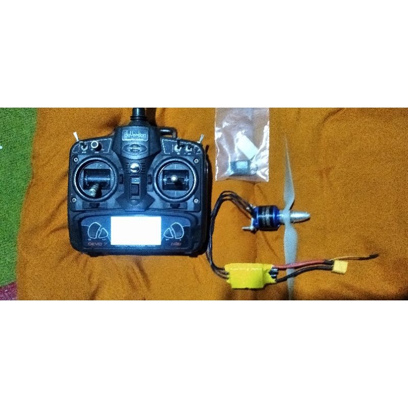 remot devo 7 +rx, brushles 3536+ esc 40a , prop 10x7