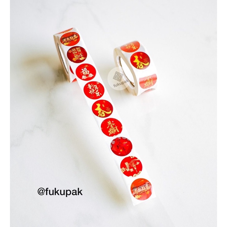 

Sticker Imlek Rol 500pcs, Label toples / kotak CNY Sincia