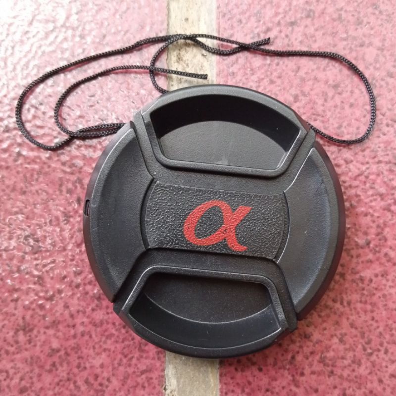 Tutup lensa kamera Sony lensa cap lenscap Sony alpha lens cap depan lensa kamera Sony