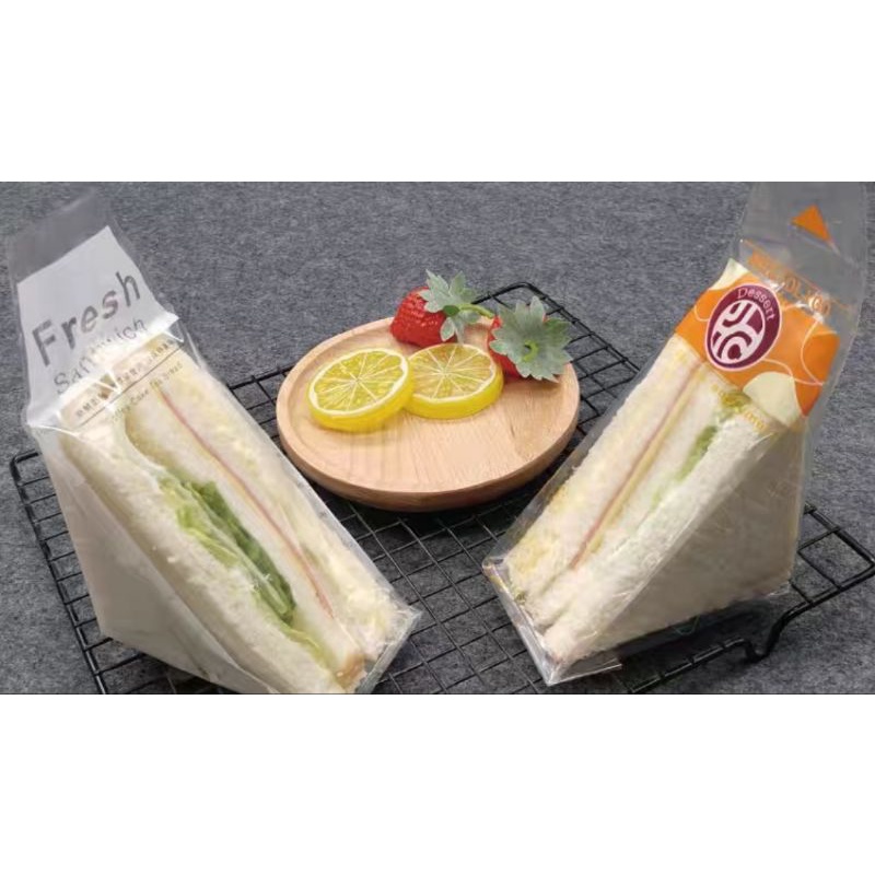 100pcs plastik sandwich/plastik segitiga / plastik burger / plastik kue /box sandwich / kotak sandwi