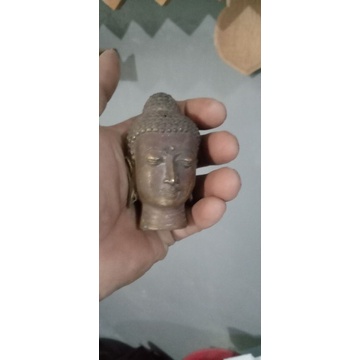 patung perunggu budha kepala